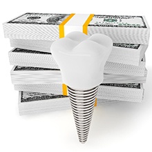 Stacks of money and model implant representing cost of dental implants in Westfield