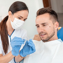 Patient and dentist discussing Invisalign in Westfield