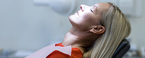 Relaxed woman in dental chair