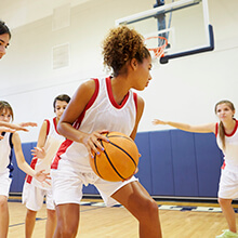 Girl playing basketball