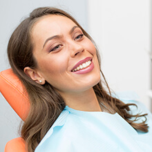 Smiling woman in dental chair