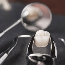 Dental instruments on table with tooth after tooth extractions in Westfield, NJ