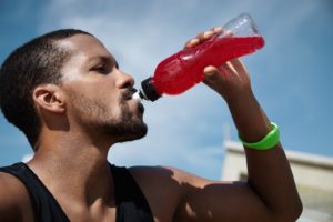 young man with sports drink