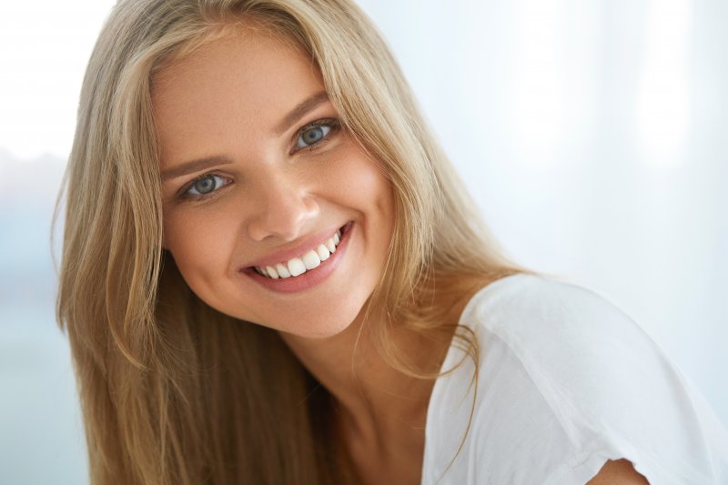 closeup of young woman smiling 