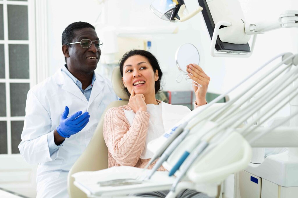 Woman smiling in the dental chair
